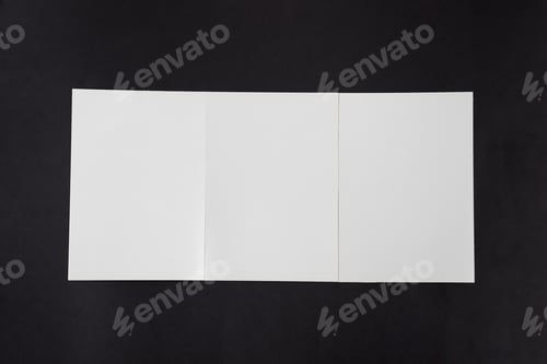 Preview: Mockup fourfold template paper brochures on a black background