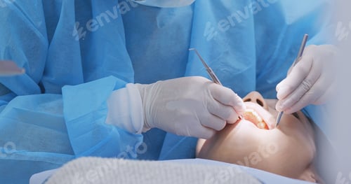 Preview: Patient having ultrasound cleaning at dental clinic