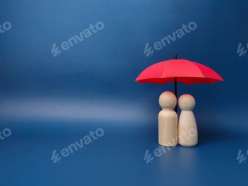 Preview: A couple of wooden dolls are hiding under a red umbrella, protecting wooden peg dolls, planning, sav