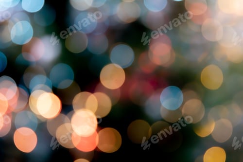 Preview: Dark background with a vibrant display of multicolored bokeh lights.
