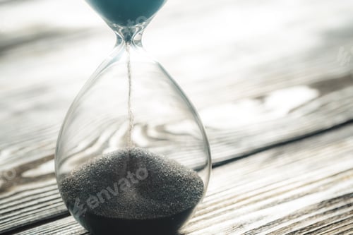 Preview: Modern hourglass on wooden background