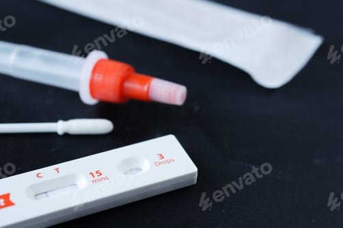 Preview: Negative Covid-19 test kit on black background
