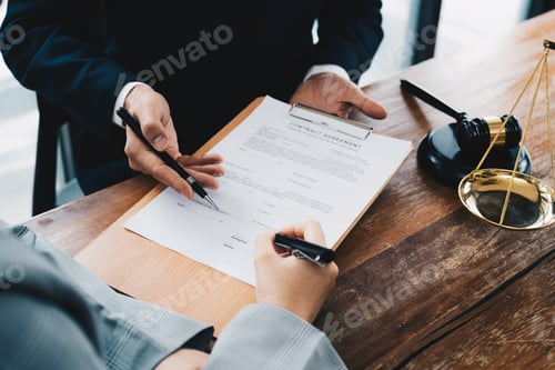 Preview: business people and lawyers discussing contract papers sitting at the table. Concepts of law