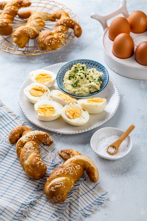 Preview: Easter brunch with bread bunny bun, egg spread and hard boiled eggs