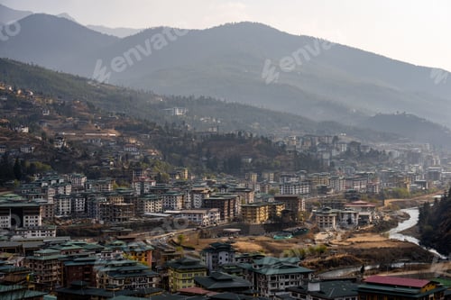 Preview: Aerial view of Paro, Bhutan showcasing dense urban residential buildings with green roofs