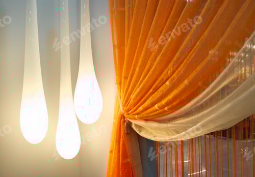 Preview: Abstract White Lamps and Orange Sheer Curtains