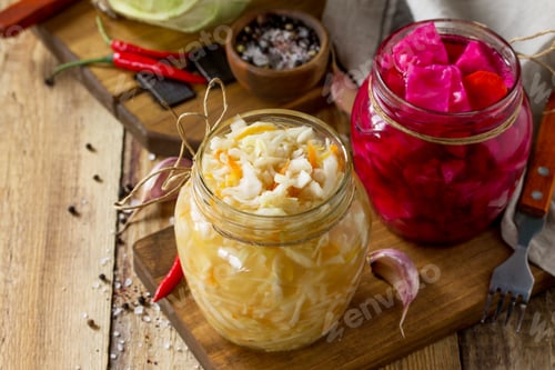 Preview: Homemade sauerkraut with carrot and salad cabbage with beetroot.