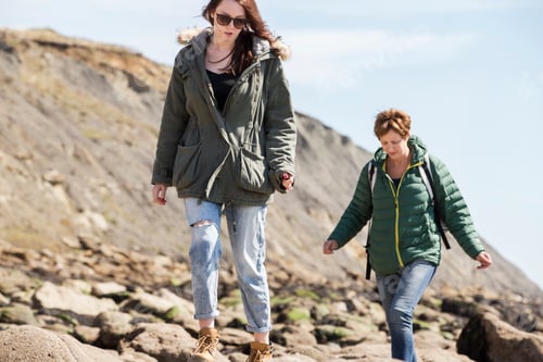 Preview: Mother and daughter walking by seaside, Folkestone, UK