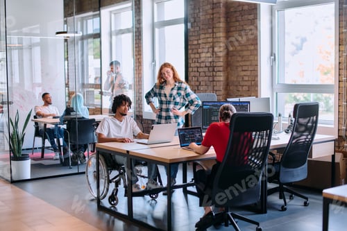 Preview: A diverse group of business professionals collaborates in a modern startup coworking center