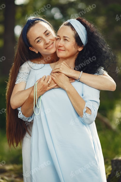 Preview: Elegant senior woman with adult daughter