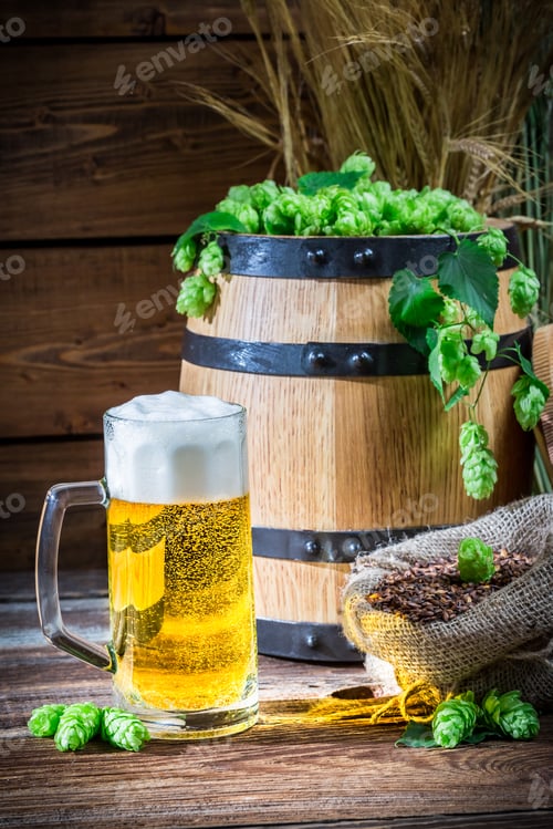 Preview: Golden color of light beers on old wooden table