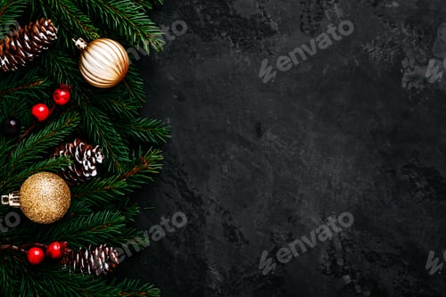 Preview: Christmas background with green fir branches, cones and golden and red decor.