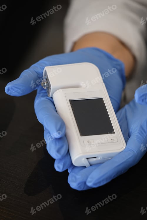 Preview: Doctor holding trichoscope for structure of the hair diagnostic trichologist