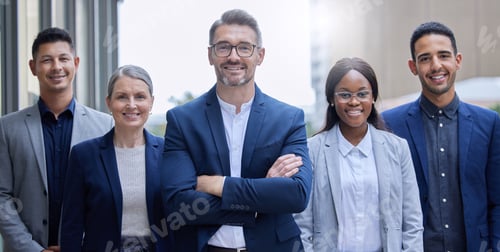 Preview: Cropped portrait of a group of corporate businesspeople standing outside with their arms folded