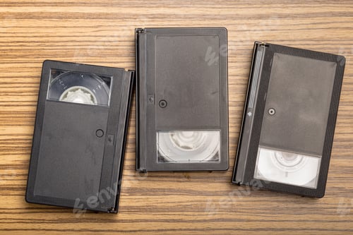 Preview: video tape cassette over wooden background