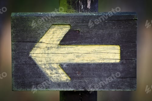 Preview: Wooden directional sign on the foothpath