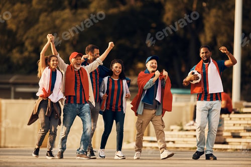 Preview: Excited soccer fans cheering for their team during sports championship.