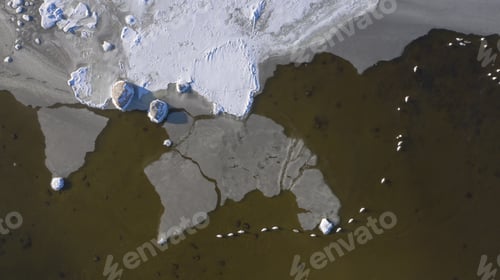 Preview: Aerial view of snow landscapes and ice floes in the sea