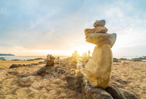 Preview: Stones pyramid on sand symbolizing zen, harmony, balance in Khao Lak Thailand