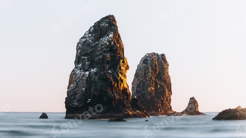 Preview: Beautiful view of rocks on a beach on a sunny day