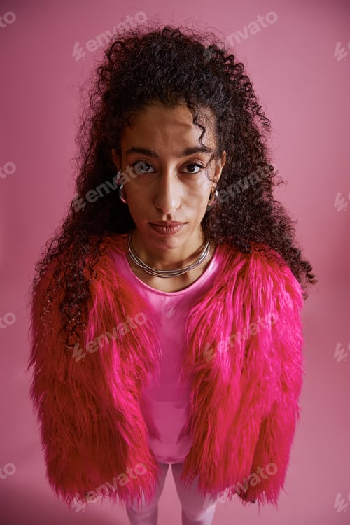 Preview: Portrait of Young Woman Posing Confidently during Fashion Photoshoot