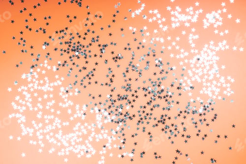 Preview: Orange background with shiny stars