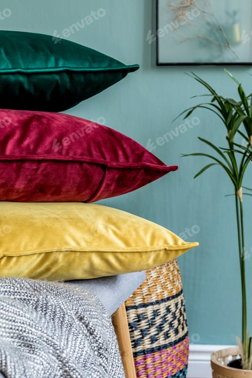 Preview: Stylish composition of cozy living room interior details and colourful classy pillows.