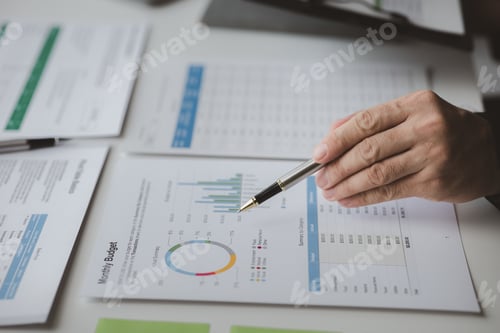 Preview: Executives and managers are meeting in a conference room, on the table there are some documents abou
