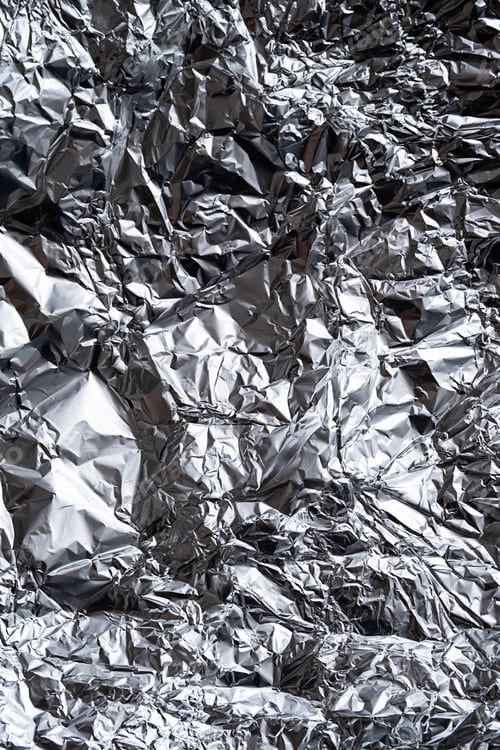 Preview: Abstract Crumpled Silver Foil Background.
