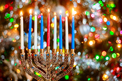 Preview: Menorah with burning candles for Hanukkah on sparkle background with defocused lights.