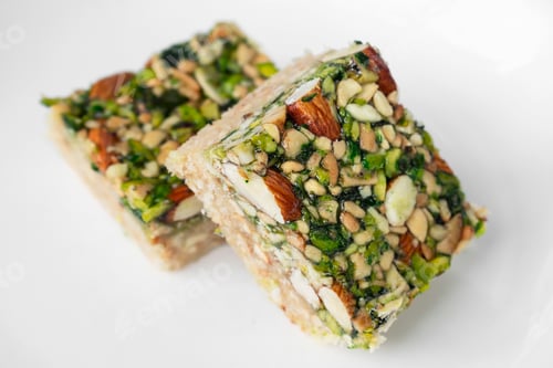 Preview: Nut and Pistachio Squares on a White Surface