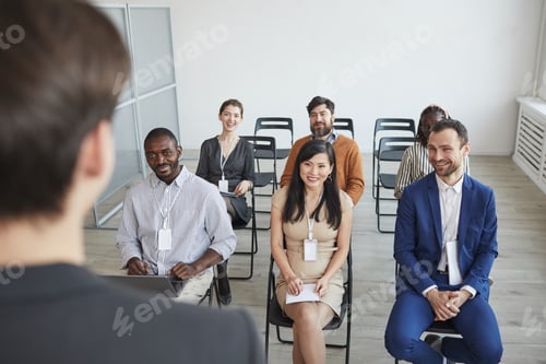 Preview: Smiling People at Business Conference