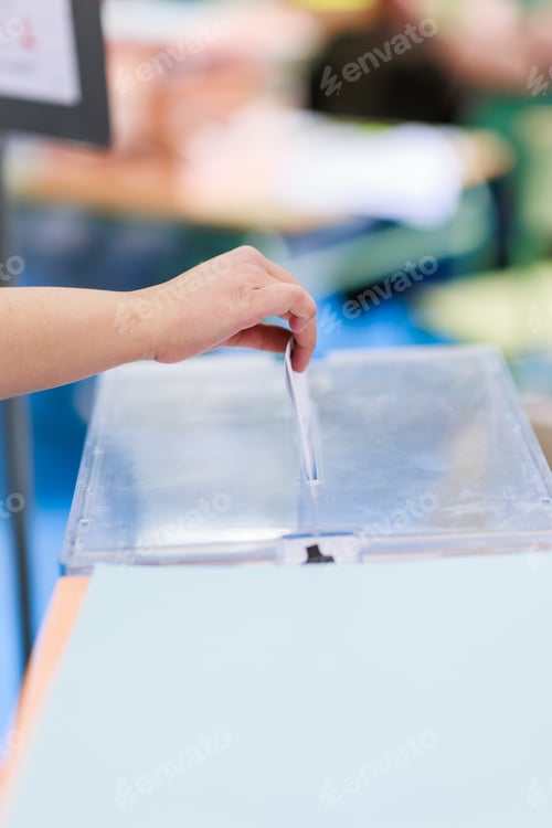 Preview: voting rights. Gypsy vote referendum suffrage unrecognizable female hand hold envelope closeup