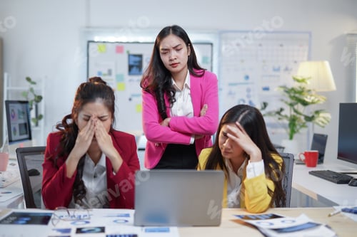 Preview: Stressed Asian Businesswomen Having Problems at Work