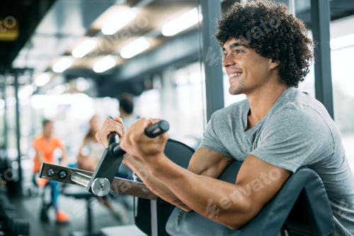 Preview: Strong ripped man training in modern gym