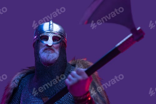 Preview: Closeup studio shot of elder viking warror with axe