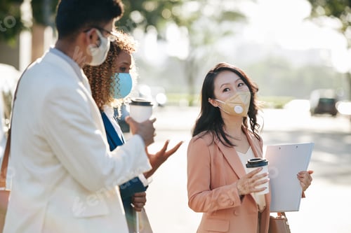 Preview: Business lady with coffee and documents