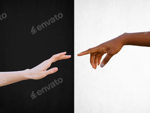 Preview: Black and white human hands reaching towards each other