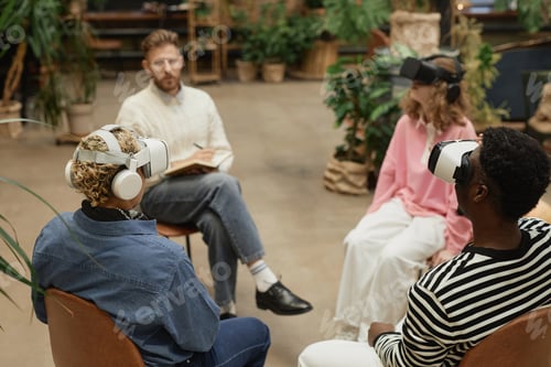 Preview: People wearing VR headsets during therapy session