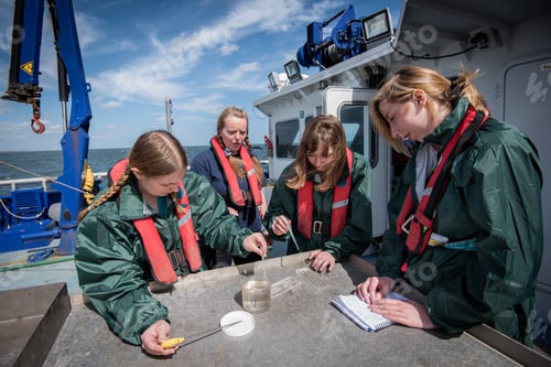 Preview: Student marine biologists test sea water sample on research ship