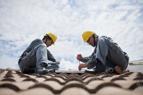 Preview: Builders IKnstalling Solar Panels on Tile Roof
