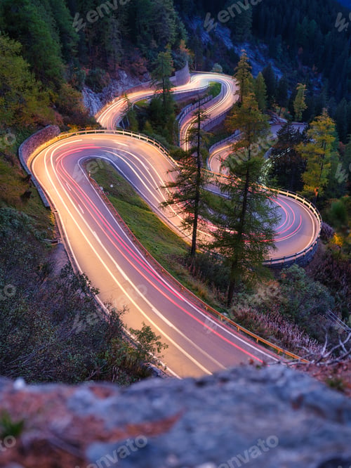 Preview: The mountain pass of Maloja, Switzerland. A road with many curves among the forest.