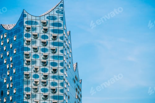 Preview: Hamburg, Germany - May 28, 2017: Top shape of Elbphilharmonie with white windows and some white