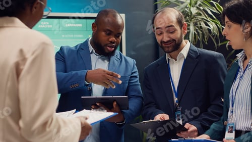 Preview: Supervisor and employees attend a status update meeting