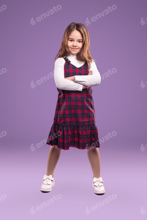 Preview: Confident schoolgirl with crossed arms
