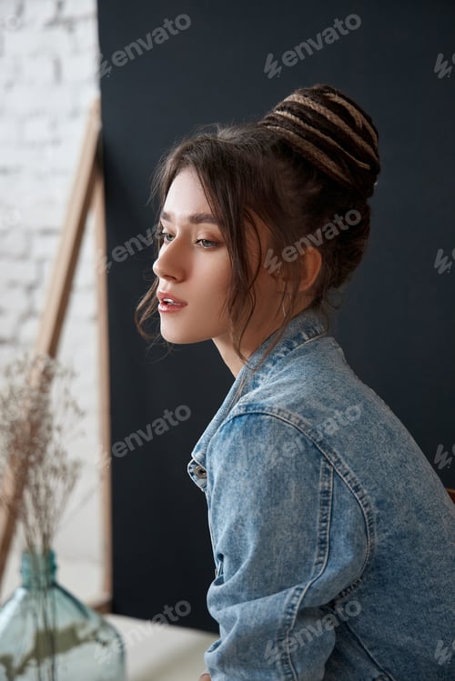 Preview: Elegant Woman with Stylish Hair in Denim Jacket