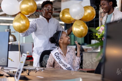 Preview: Congratulating woman with balloons and flowers, colleagues celebrating success at office