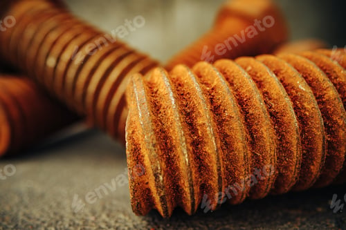 Preview: Old rusty bolt on grey background macro