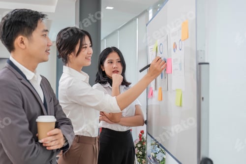 Preview: Casual creative happy two smile asian business people plan strategy analysis and brainstorm putting