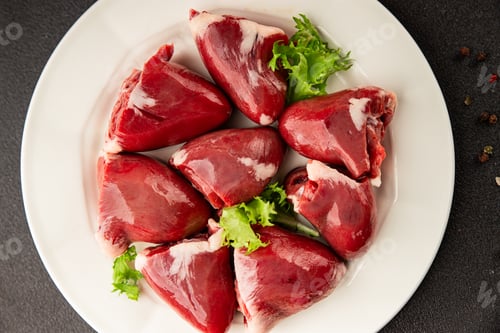 Preview: Turkey heart offal meat tasty snack fresh delicious gourmet food background on the table